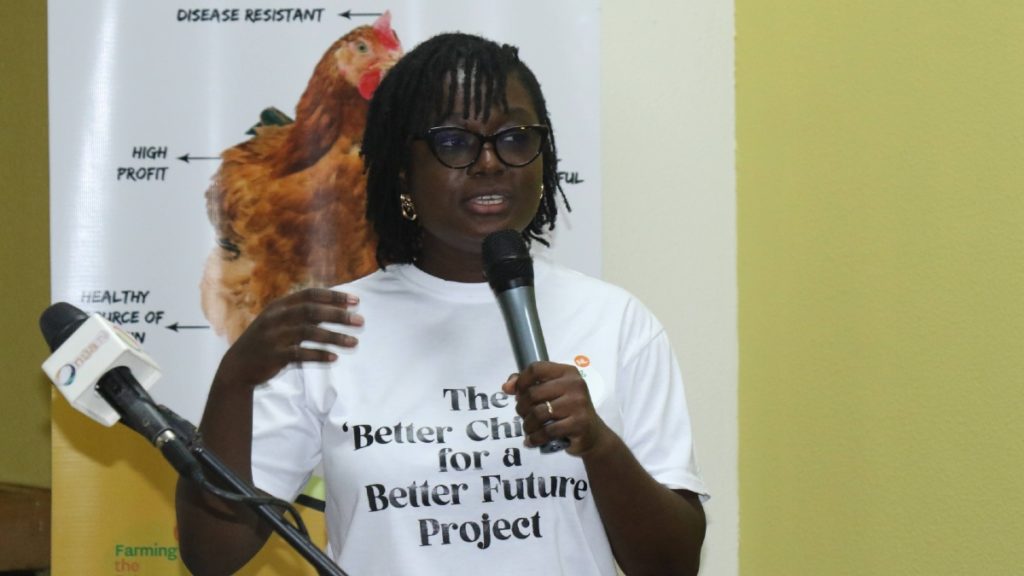 Project coordinator Priscilla Obirikorang addresses partners and smallholder farmers at a Better Chicken for a Better Future event.