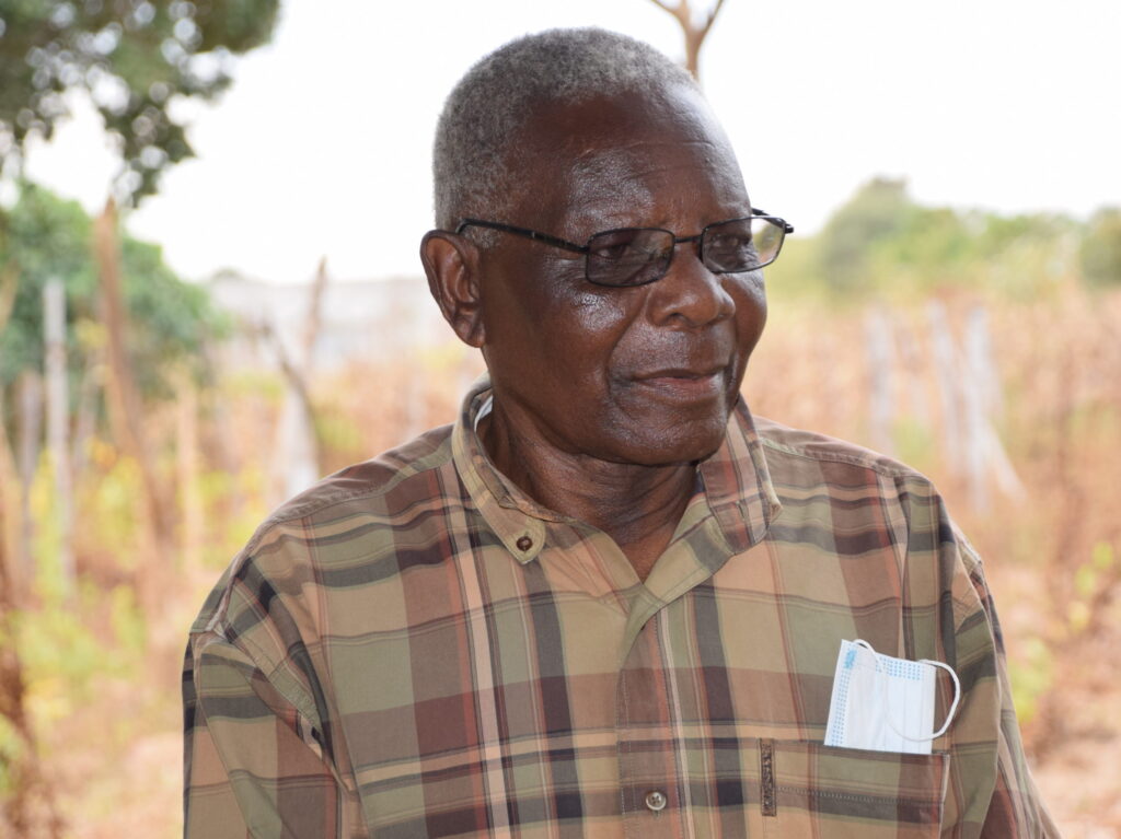 A portrait of Mr. Goodson Kalolo, avocado farmer in Zambia