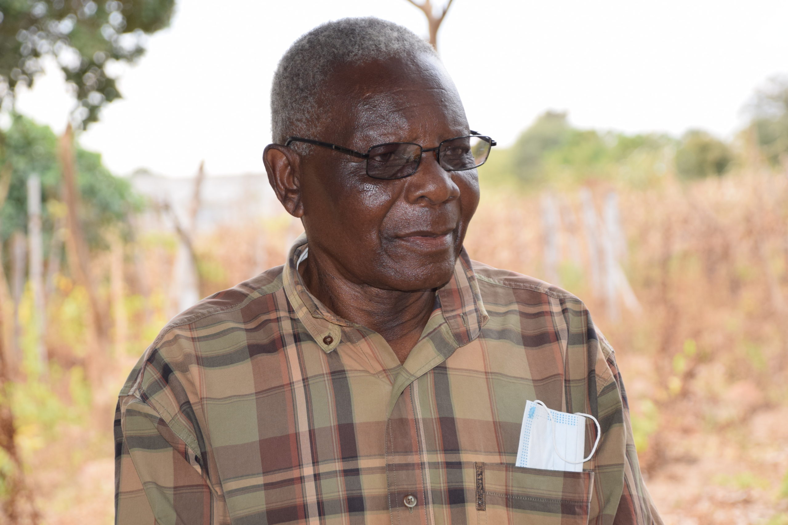 A portrait of Mr. Goodson Kalolo, avocado farmer in Zambia