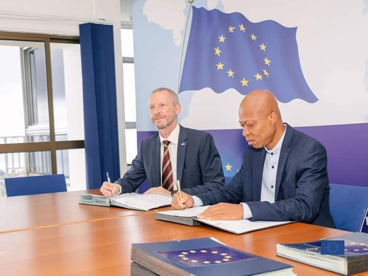 Head of Cooperation at the European Union in Sierra Leone left and Country Representative of Solidaridad in Sierra Leone right signing the partnership