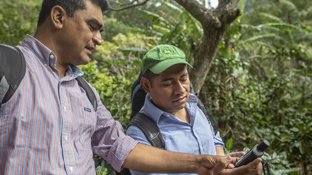 Two men are testing a digital tool in the field