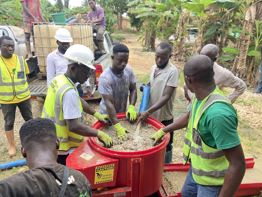 Miners test out the new mercury-free processing equipment for gold mining.