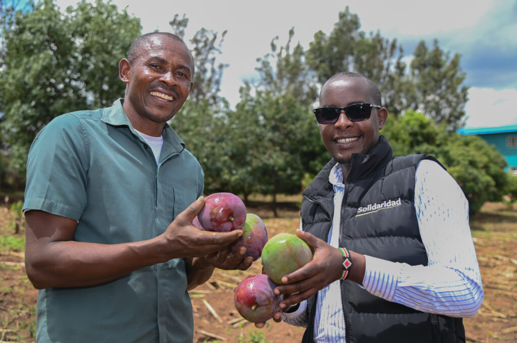Micheal Wachira in his fruit and vegetable farm in Nakuru County, Kenya