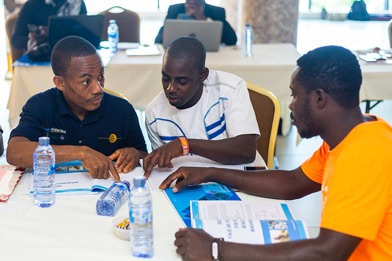 SCORE training working sessions with participants from small and growing businesses in Ghana